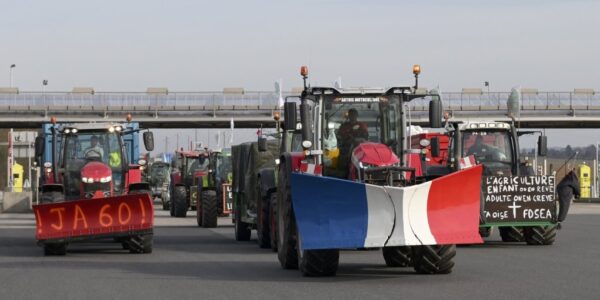 France’s protesting farmers encircle Paris with tractor barricades, vowing a ‘siege’ over grievances