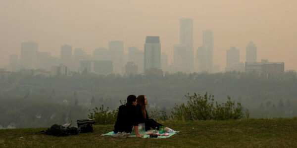 Wildfire in Canada’s British Columbia forces thousands to evacuate. Winds push smoke into Alberta