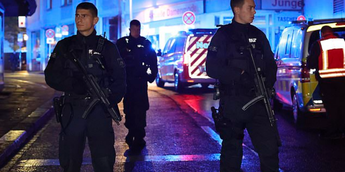 ‘Terror attack’ in Germany: Knifeman leaves several dead after stabbing random passersby in the neck at diversity festival – as armed police swarm streets and launch desperate hunt for killer and suggest he is still dangerous