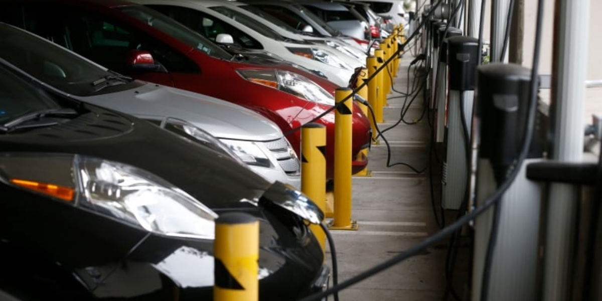 EV sales are still growing. So why are carmakers pulling back?