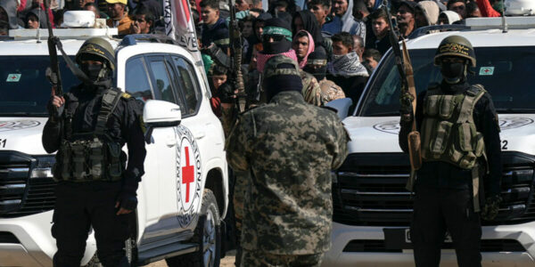 Gazan civilians celebrate gruesome Hamas spectacle with murdered Israeli children