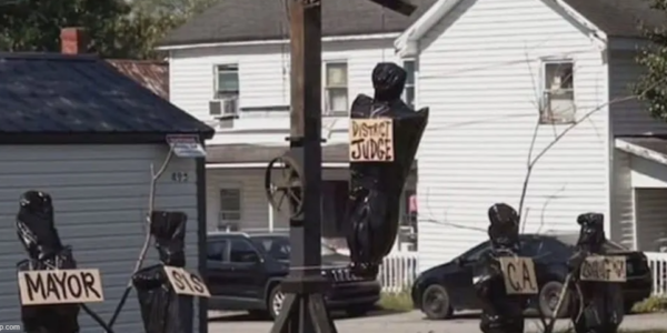 Man arrested for Halloween display depicting local officials in body bags: police