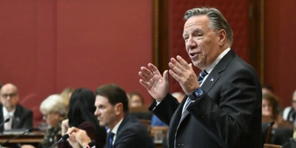 Quebec government adopts secularism bill forcing students to uncover faces
