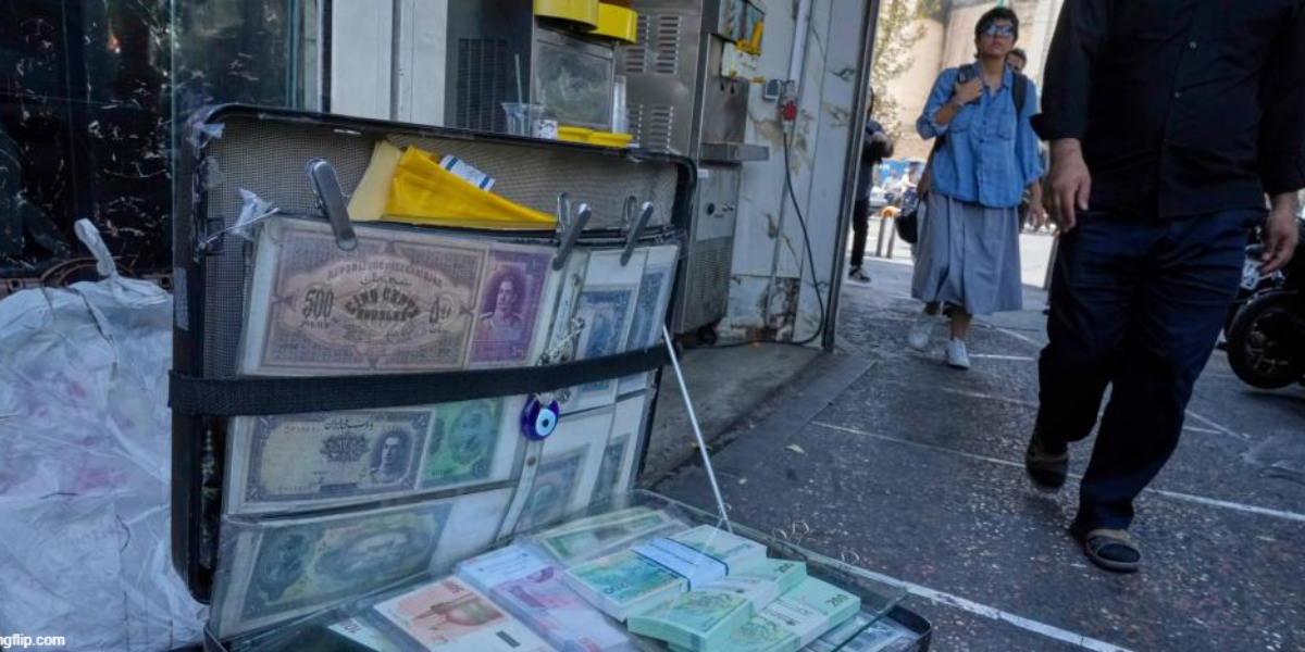Iran’s currency falls to new low as nuclear sanctions squeeze ailing economy