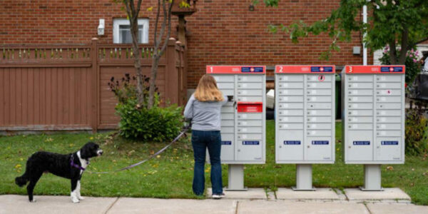Canada Post says it will move ahead with plan to end home delivery