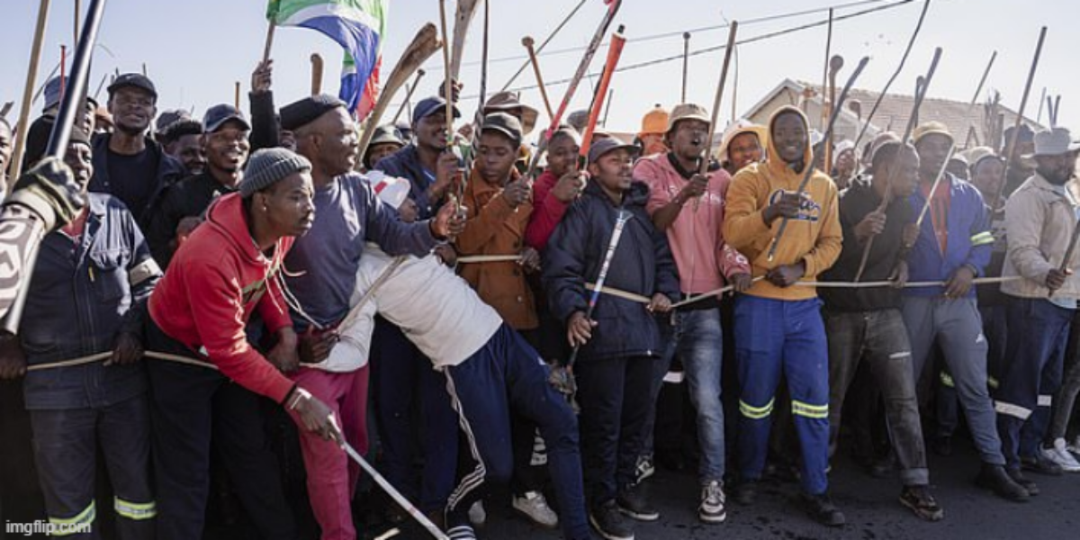 Anti-migrant protesters march through South African streets following spate of violence and vigilante threats