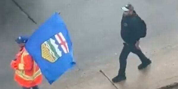 Man shoved into traffic for waving Alberta flag speaks out: ‘I could have been killed’