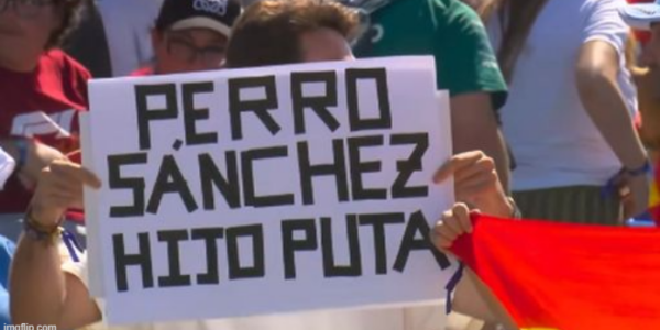 Fan’s Fake F1 Sign Sneaks Brutal Anti-Government Message onto Live Broadcast